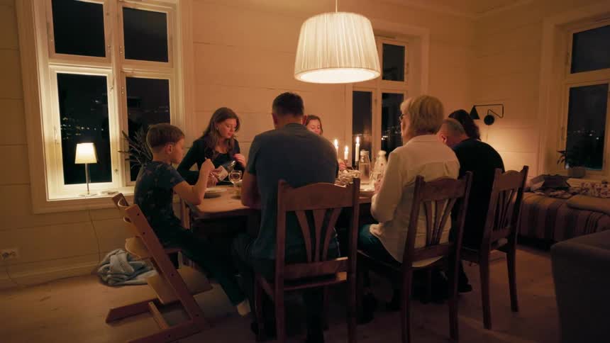 The family is having a meal at home