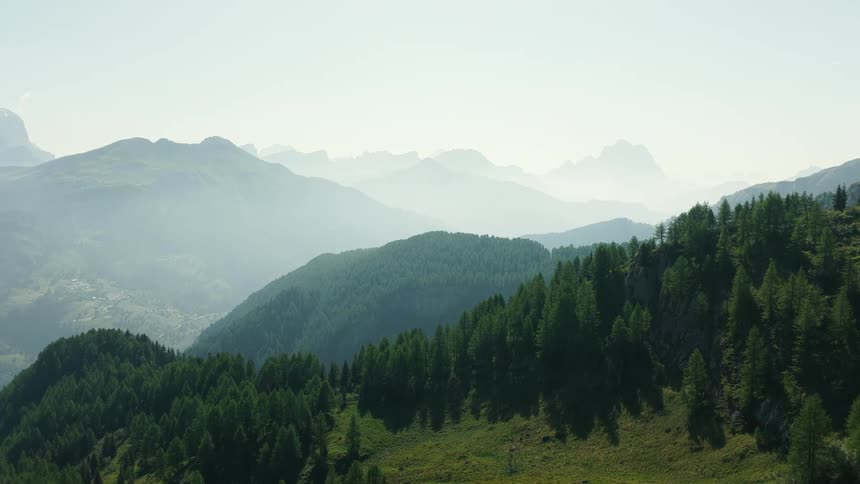 Aerial panorama of mountains with green forests