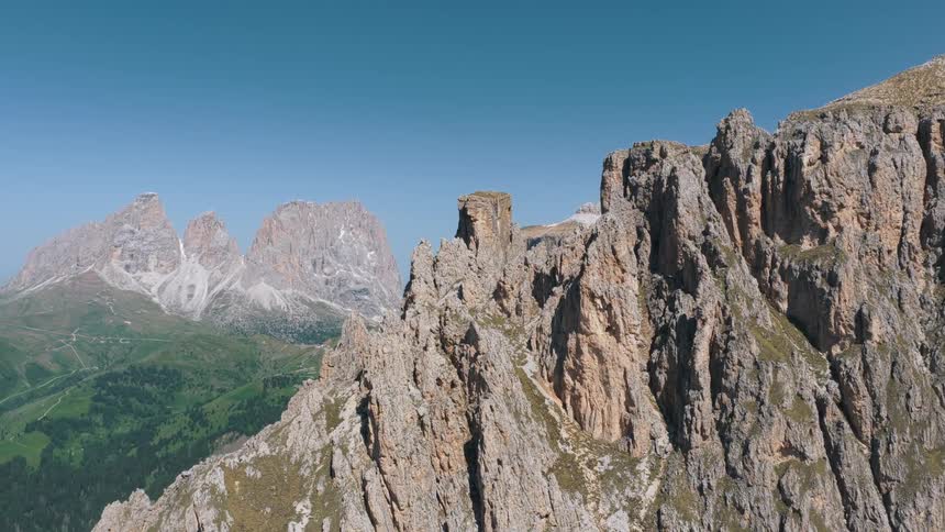A large mountain range on a sunny day