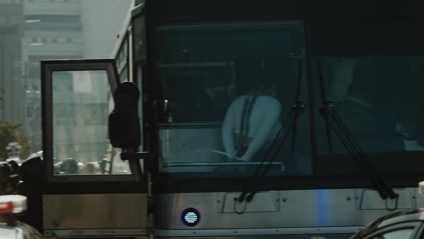 LAPD and ICE are loading immigration detainees and prisoners onto a bus to be deported