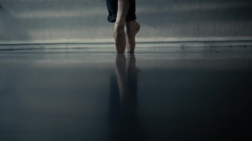 Feet of a female ballerina dancing