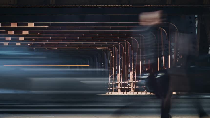 Time lapse of vehicles and pedestrian traffic crossing a busy city street