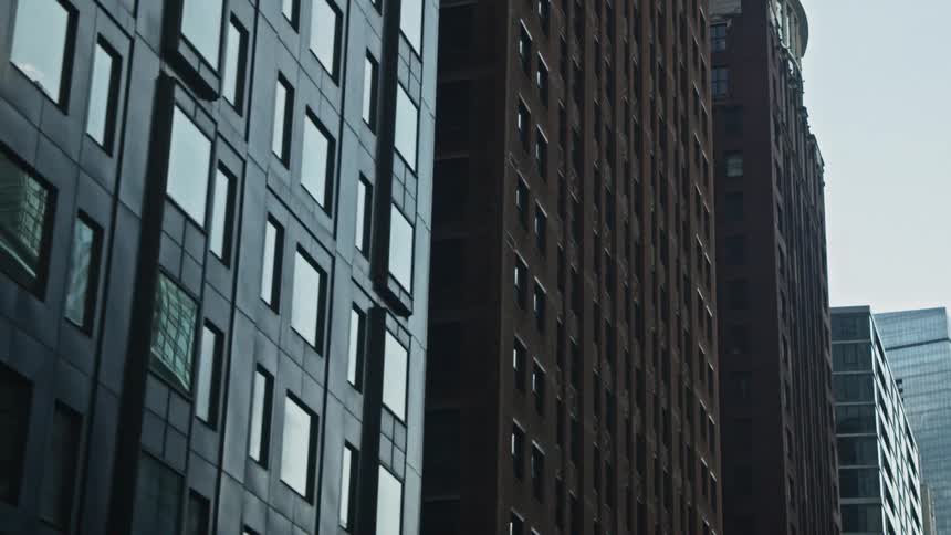 Imposing buildings of a metropolis on a cloudy day