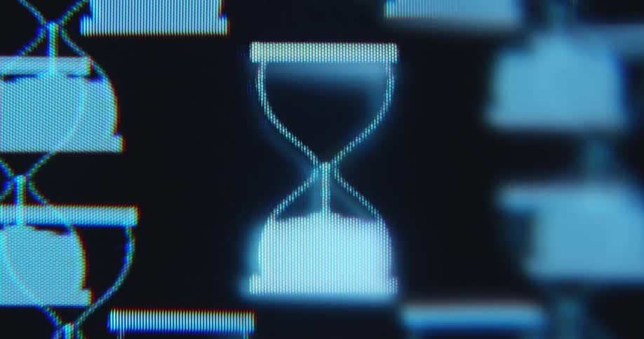 Extreme macro closeup of a tube TV screen displaying several hourglasses spinning and rotating as the waiting period starts and ends over and over again while the waiting time takes forever due to very slow progress and low speed
