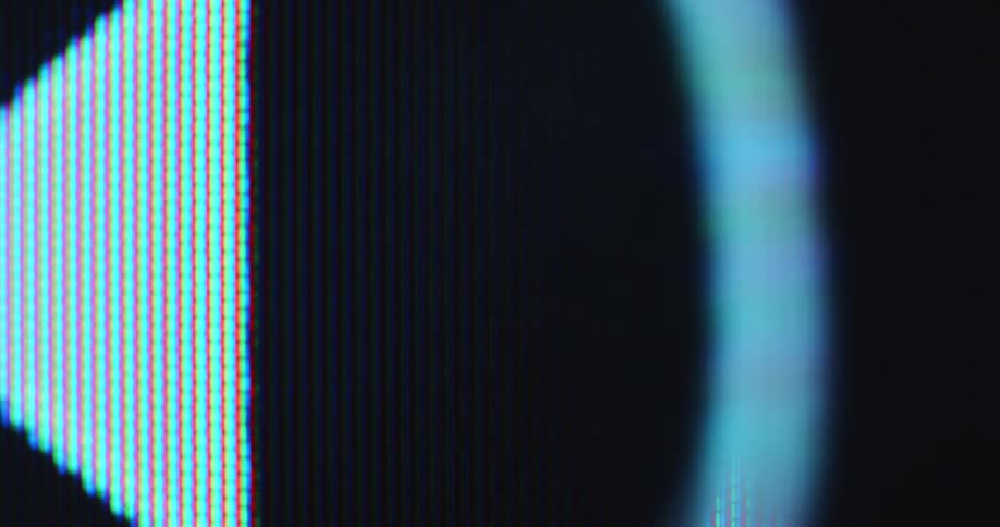 A blueish or white sound icon flashes on a computer screen and briefly distorts as the sound waves move with loud volume causing distortion due to bass and other frequencies