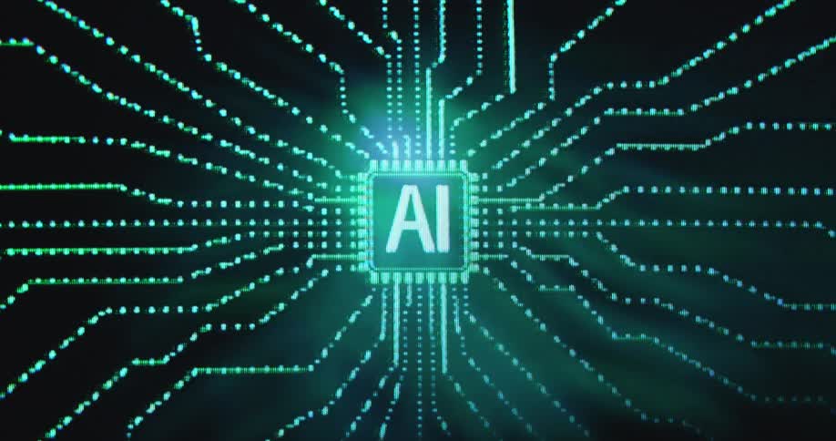Futuristic animation of a virtual reality or hologram displaying a pixelated AI symbol in the center of a symmetrical computer chip set or printed circuit board with green data lines and wires connecting it to the internet