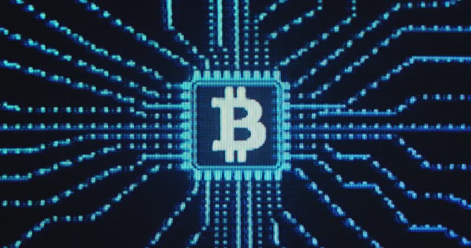 White Bitcoin symbol on a computer hardware chip animated in a virtual reality space displayed on a computer screen as blue data flows symbolizing the power of this digital asset class and blockchain technology with crypto currency networks