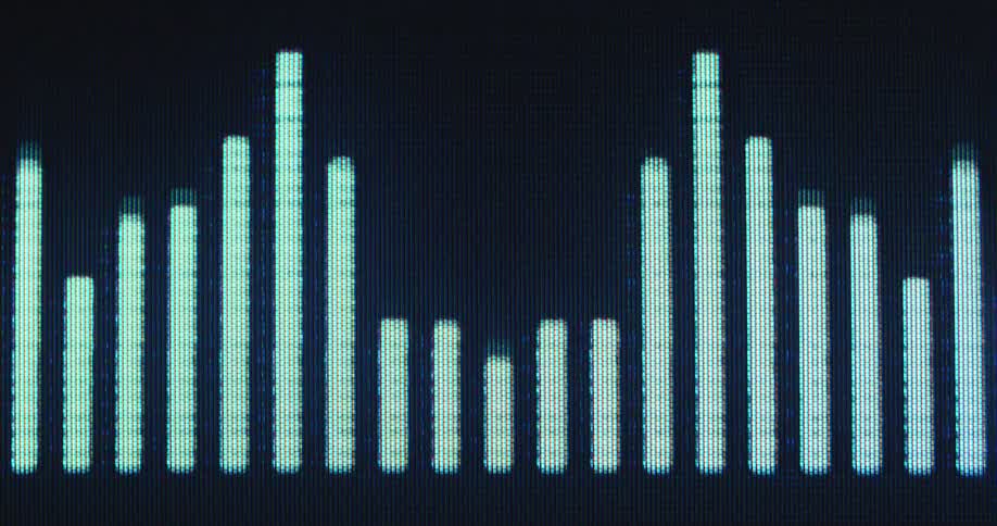 Pixelated black RGB screen of an old tube television or computer showing white bass sound graphs of an equalizer animation visualising the audio data from a music player or stereo system