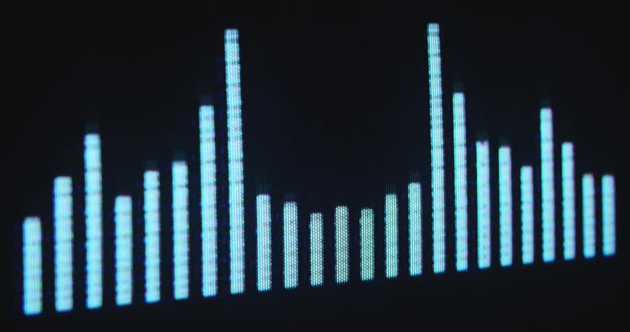 Sound bars of a digital EQ or Equalizer rise and fall on a screen as a symbol or visualization for sound in the digital world of online streaming platforms and audio books played on display devices such as computers or smartphones