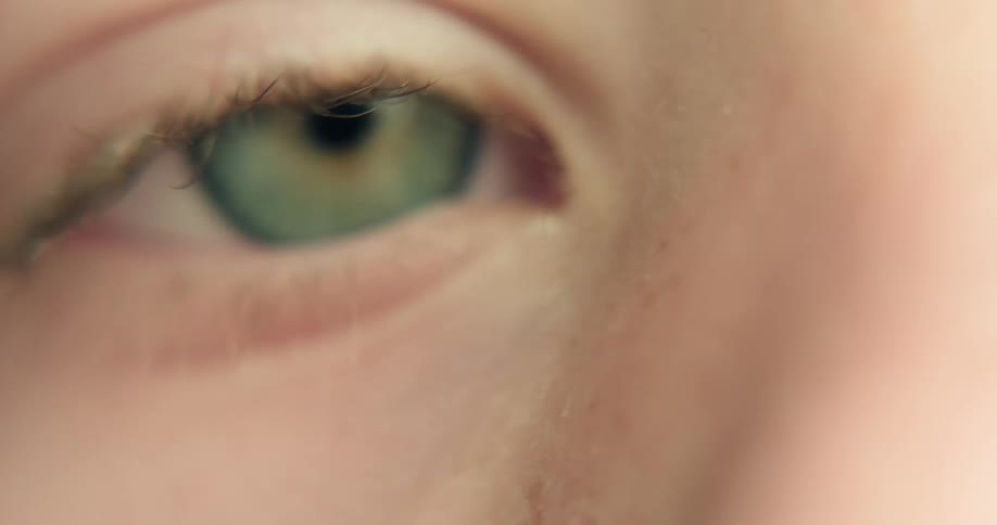 The person blinks their eye