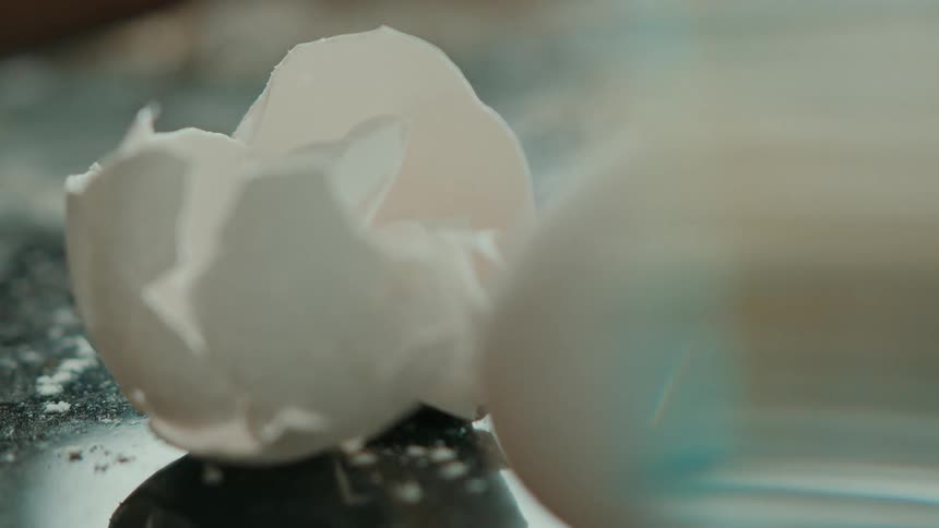 Close up of broken eggshells on a kitchen counter top