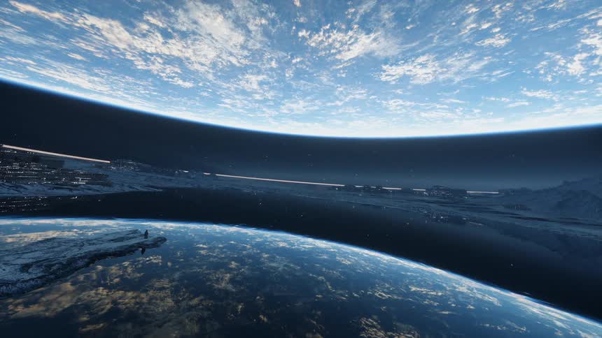 Figure stands on the shore of a reflective lake while the water reflects a blue and white planet during the night