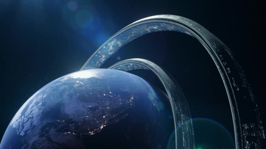A view of earth from space shows city lights across continents and a massive ringlike structure encircling the planet