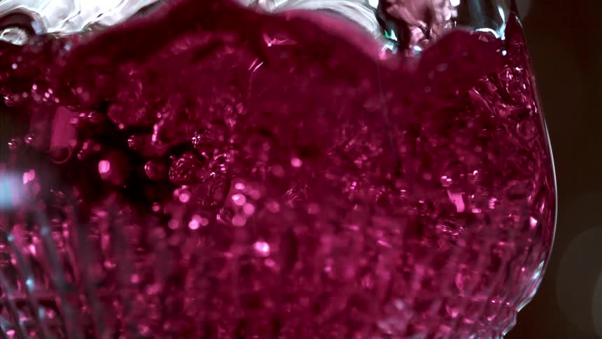 Wine swirling in a nearly full glass