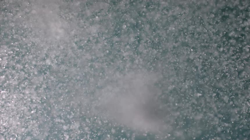 Boiling water and steam rising up