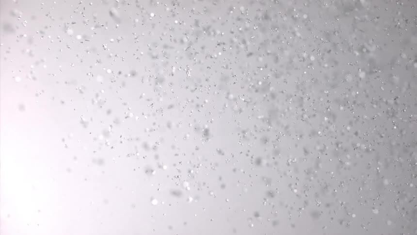 Shards of glass fly up and fall down