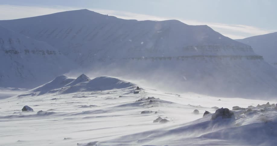 The wind is blowing the snow on this mountain