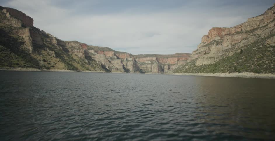 Small waves break the surface of a mountain lake