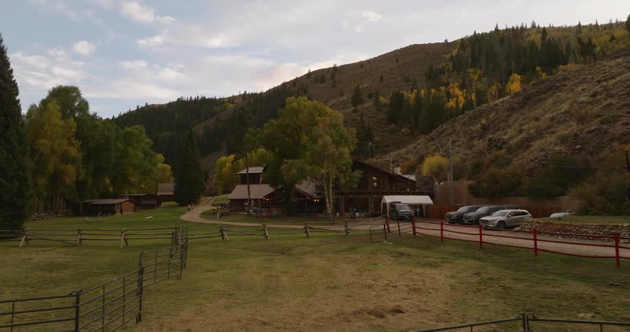 Hills surround the back of the cabin