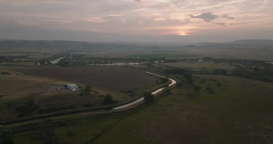The sun is rising on the landscape