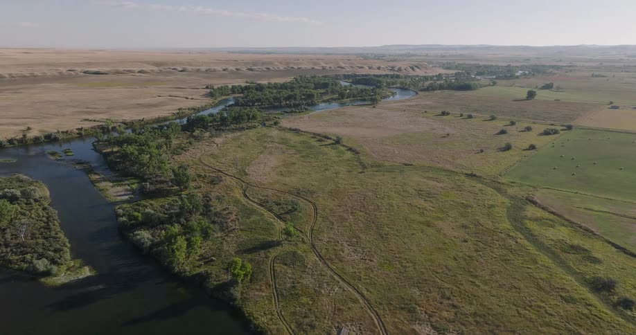 Aerial view of a river flowing through the plains