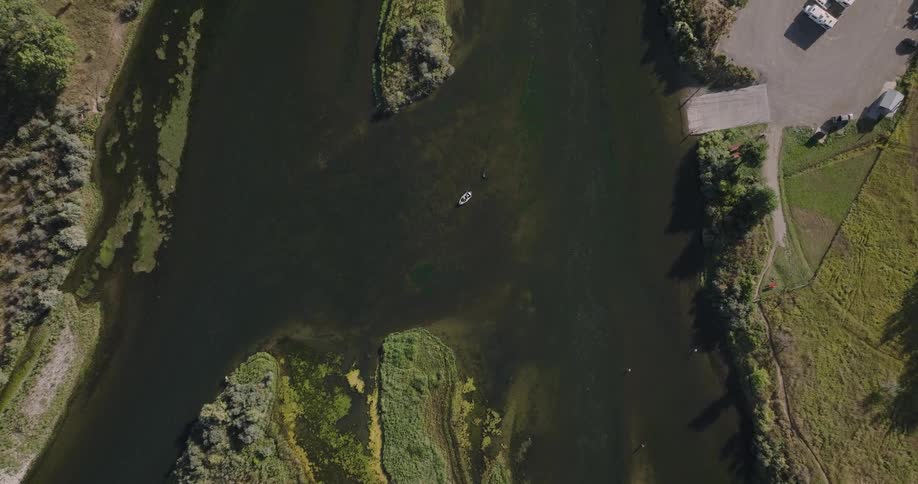 Boats are on the shore of the stream