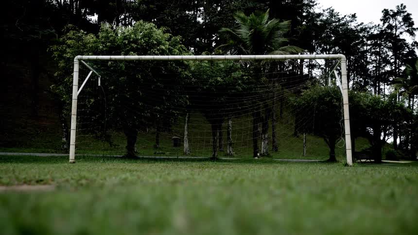 A soccer net in a sports field