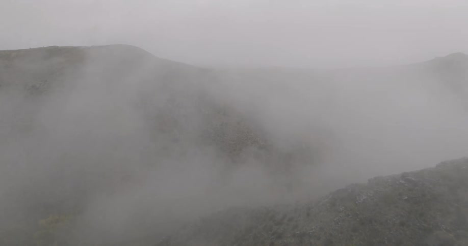 Aerial view of mountains on a foggy day
