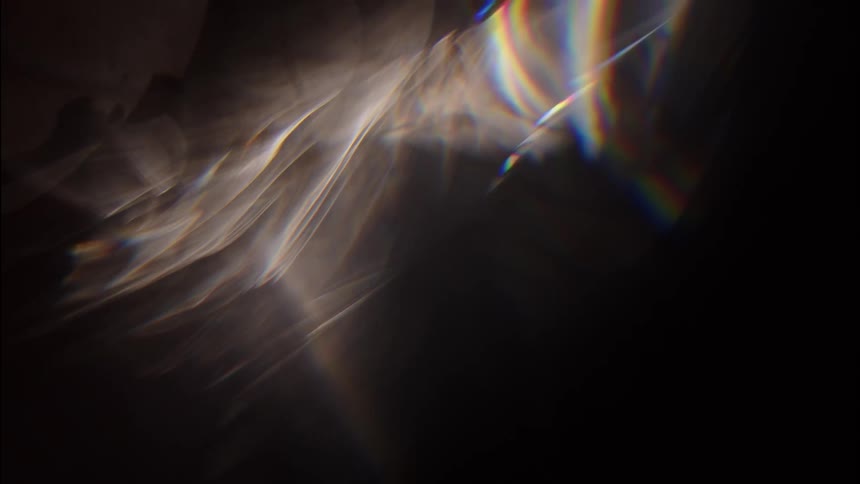 Abstract reflection of lights against a black background