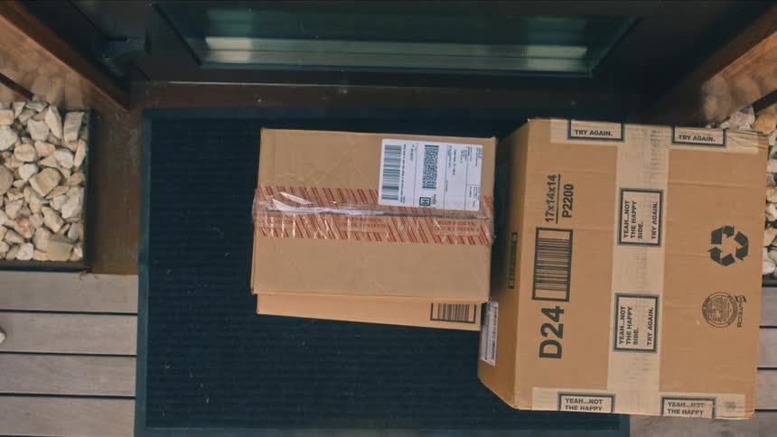 Time lapse of many packages being delivered to the front door