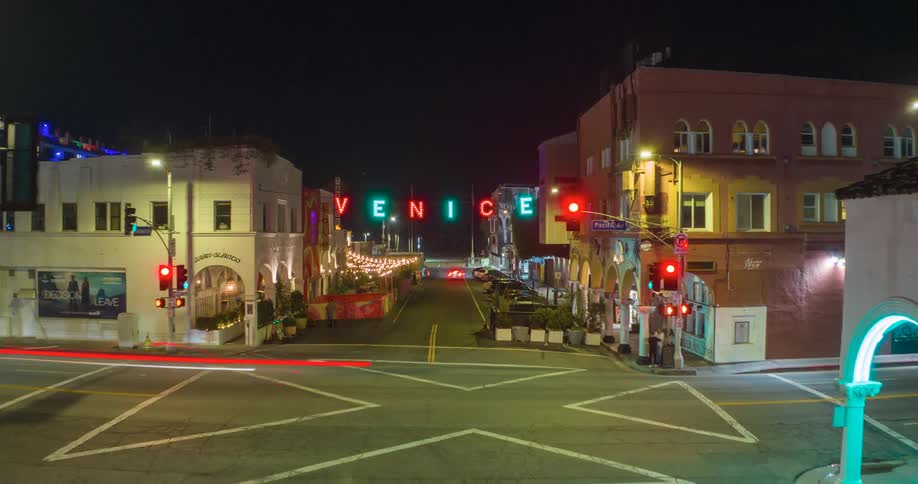 Aerial hyperlapse of the Venice Beach sign at night