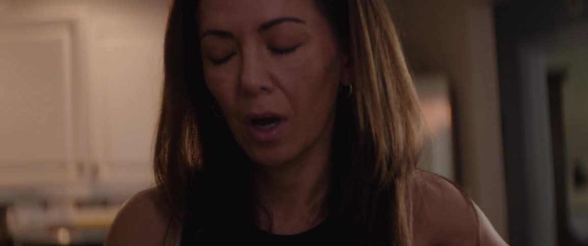 A woman gets angry and throws her mail