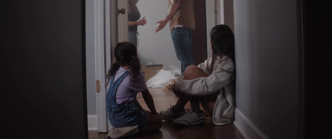 Children watch their parents argue