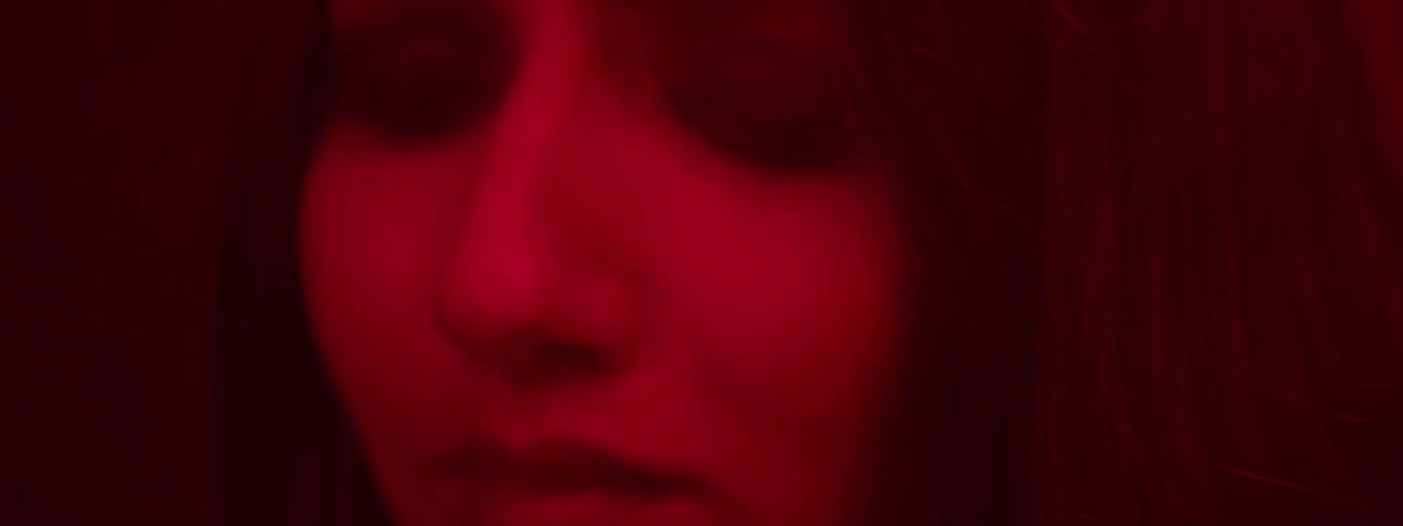 Woman looks up and cries