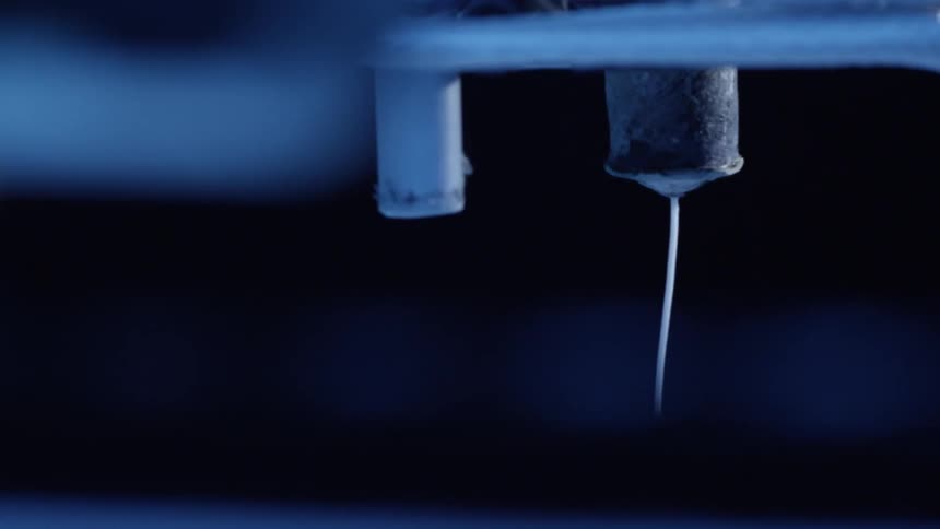 Close up of the hotend assembly unit in an operating 3d printer