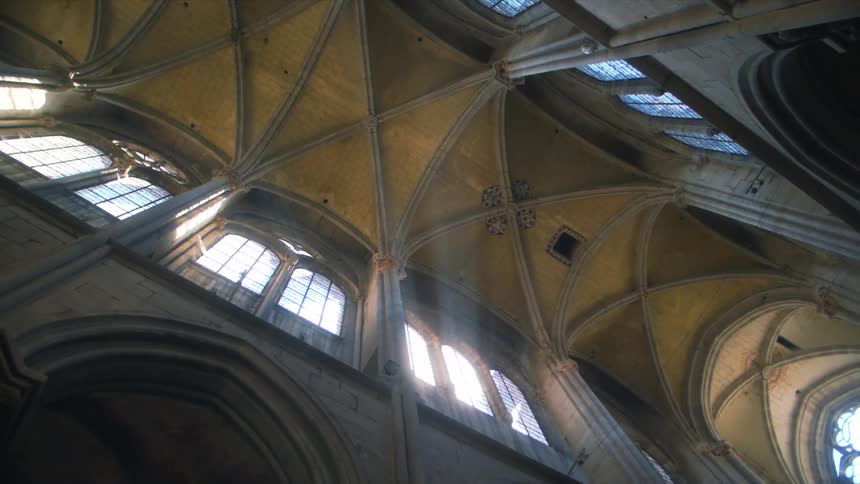 Light filters through windows in a church
