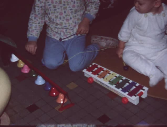 Children play with toys in a home