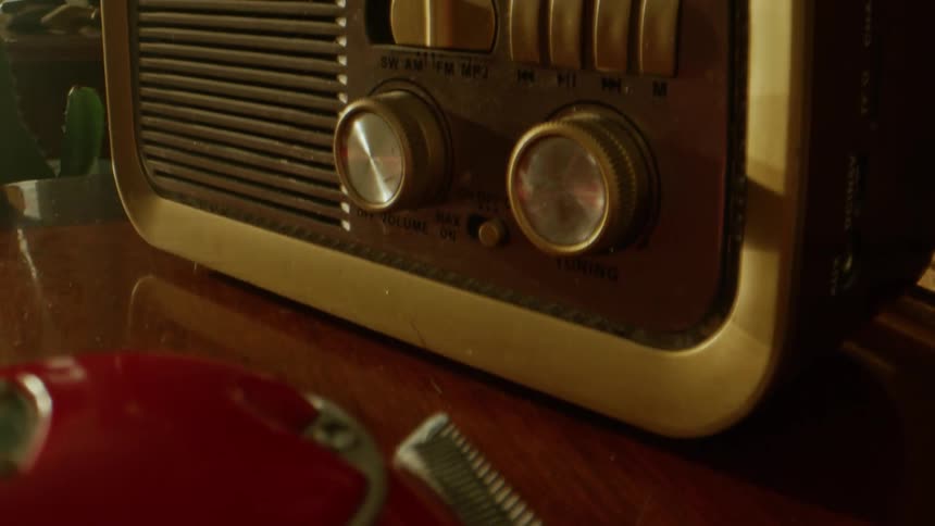 Vintage radio on a wooden bench
