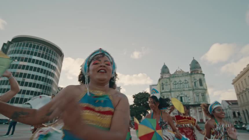 Umbrellas are spinning in the dancers hands
