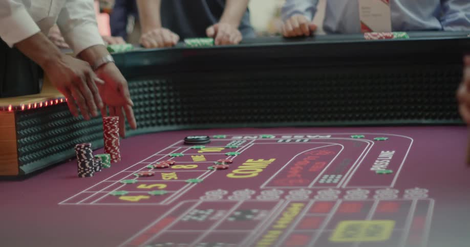 People are playing a casino game with chips