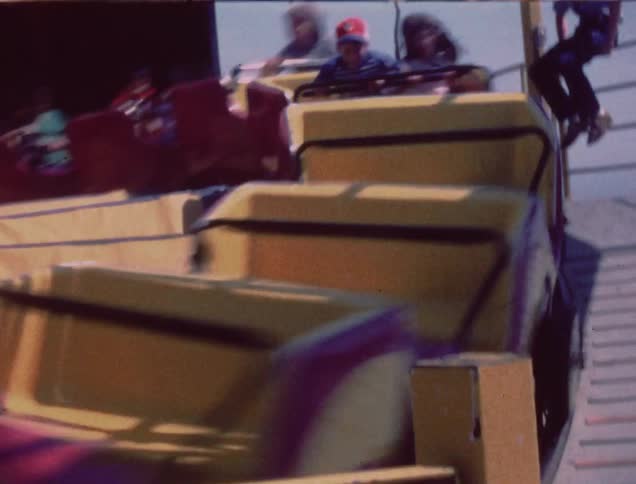 A roller coaster speeds along the track