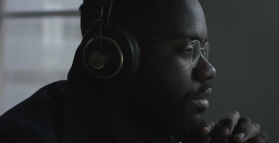 A man listens to music on headphone