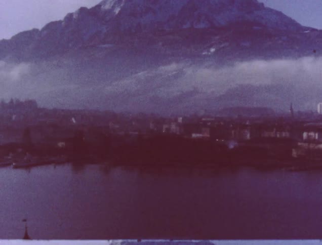 A city between a mountain and a body of water