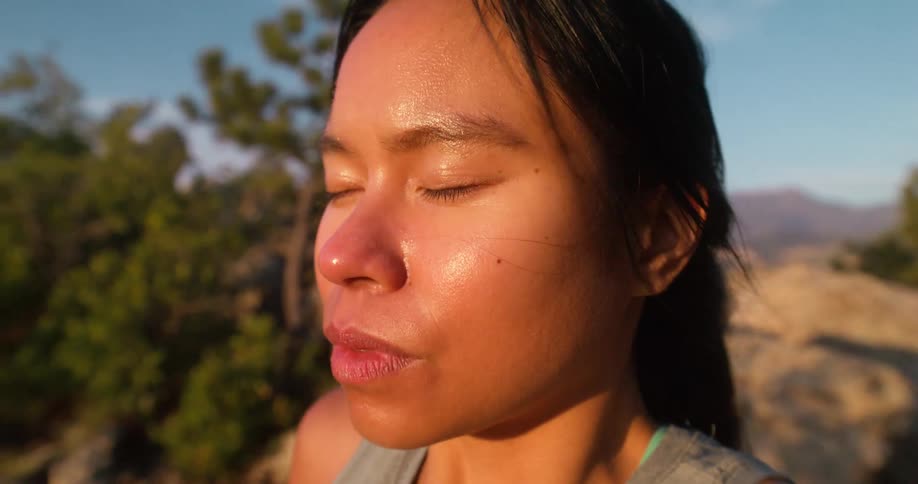 A woman is sweating on a windy day