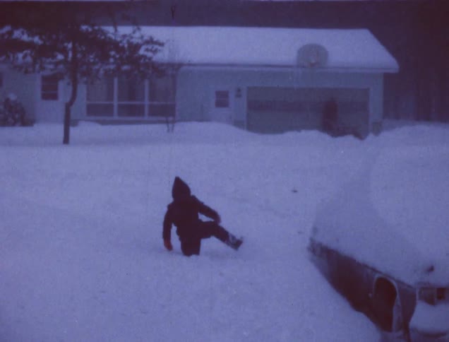 A child plays in the snow