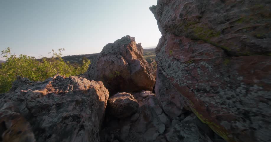 Large pieces of stone are near the cliff