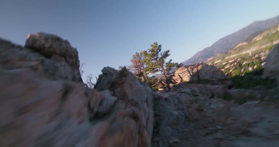Trail environment on a mountain surrounded by rocks