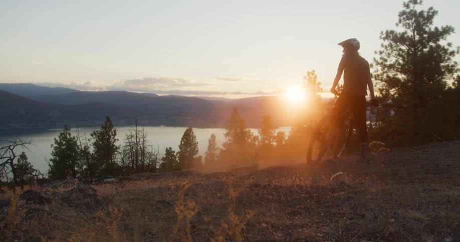 The man stops short on his mountain bike