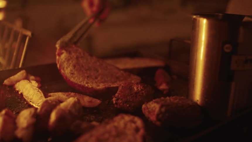 Food being grilled on a barbecue grill