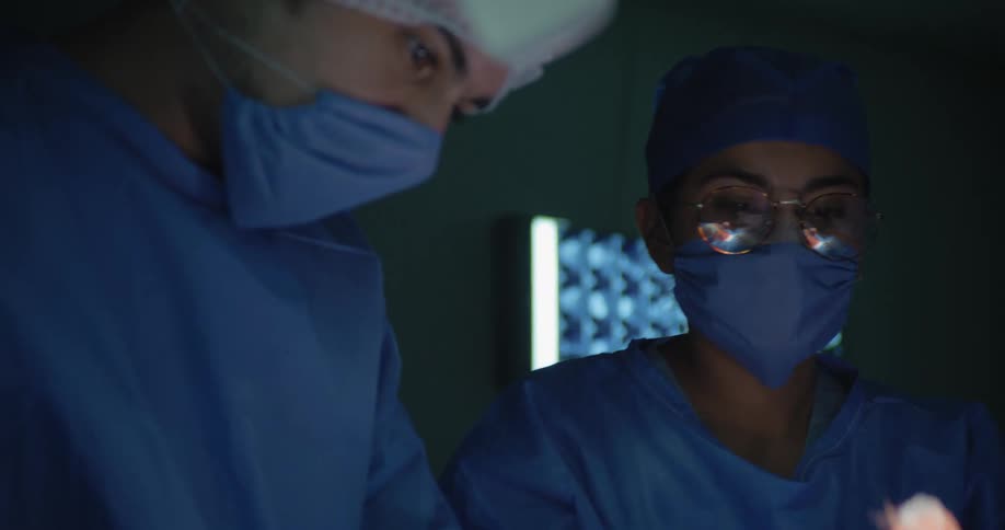 Hospital workers are performing surgery in the operating room